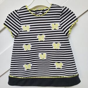 Black and white striped with yellow butterfly dress